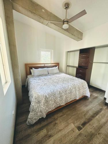 a bedroom with a bed and a ceiling fan at Mary s house in Fairbanks