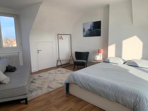 Ένα ή περισσότερα κρεβάτια σε δωμάτιο στο La Villa Brise Marine