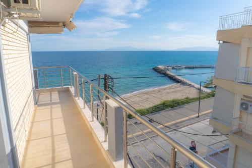 a balcony with a view of the ocean at Poseidon's Balcony by Infinity in Nea Kalikratia