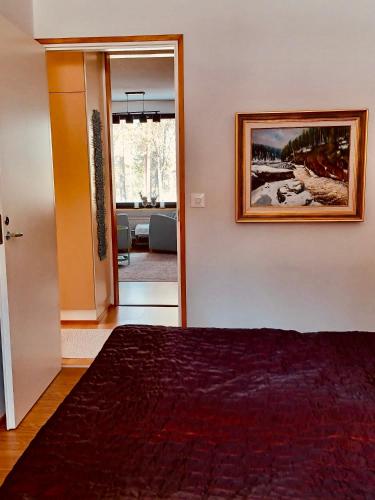 Ένα ή περισσότερα κρεβάτια σε δωμάτιο στο Kitka riverview retreat with sauna
