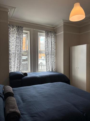 Postel nebo postele na pokoji v ubytování Superb Triple Room near Croke Park - 5