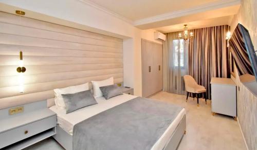 Llit o llits en una habitació de апартамент в центре