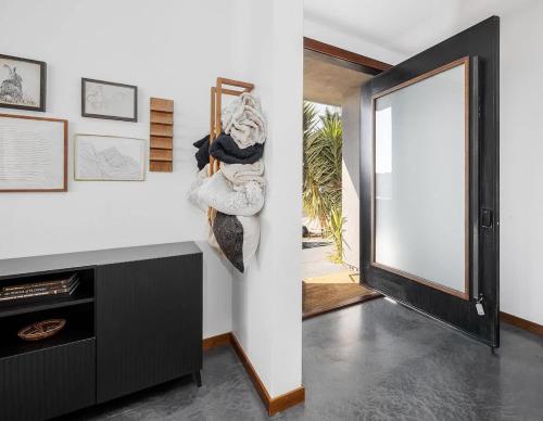 a room with a white counter and a door at Large Home With Sauna in Vista