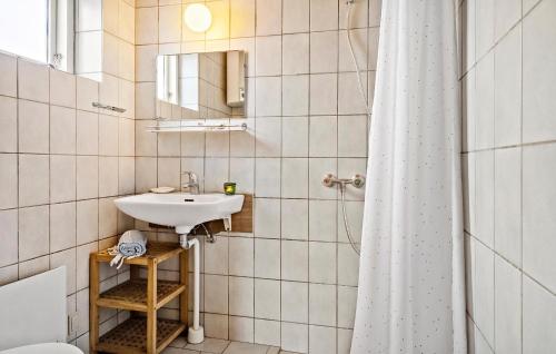 a bathroom with a sink and a shower at 2 Bedroom Cozy Home In Thisted in Thisted