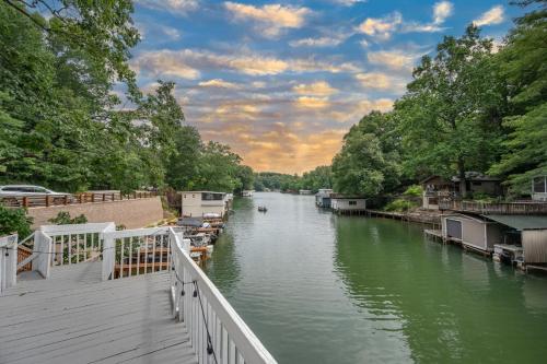 a view of a river with boats in it at Waters Edge Hideaway Lakefront Pet Friendly in Lake Lure