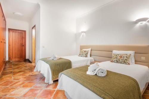 Ένα ή περισσότερα κρεβάτια σε δωμάτιο στο Villa Las Rosas