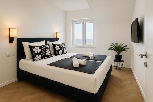 Postel nebo postele na pokoji v ubytování Villa Stanic