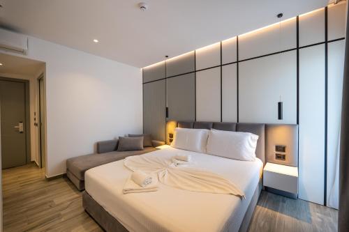Postel nebo postele na pokoji v ubytování ADMIRO Hotel