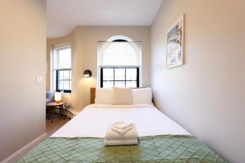 Ένα ή περισσότερα κρεβάτια σε δωμάτιο στο Spacious Studio Prudential Area