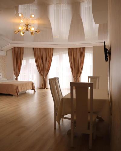 Ένα ή περισσότερα κρεβάτια σε δωμάτιο στο Hotel Stas