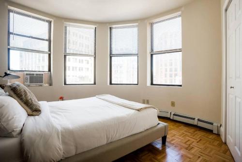 Кровать или кровати в номере Exceptional 1BR Apartment in Downtown Boston