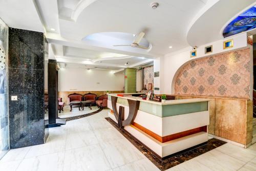 a lobby of a hotel with a bar at Hotel Chanchal Deluxe - New Delhi Train Station in New Delhi