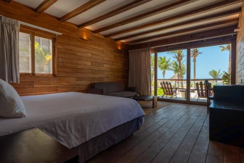 Postel nebo postele na pokoji v ubytování Blue Holbox