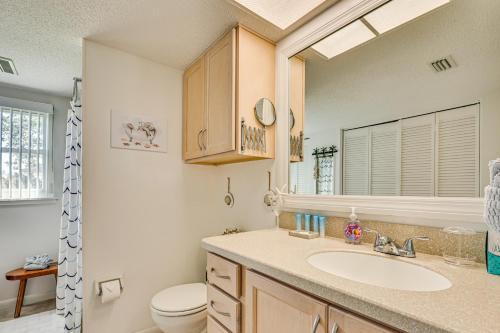 a bathroom with a sink and a toilet at Outdoor Oasis Canal-Front Home in Crystal River in Crystal River