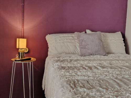 Postel nebo postele na pokoji v ubytování El Chirris B&B