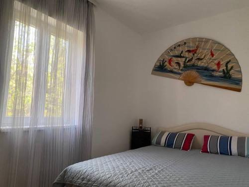 Postel nebo postele na pokoji v ubytování Apart hotel St.Pijerre