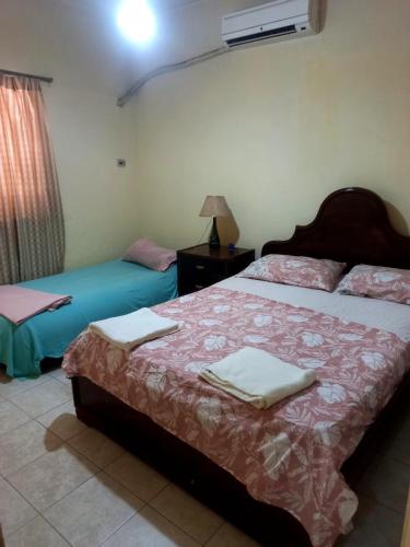 Llit o llits en una habitació de Fortaleza 2