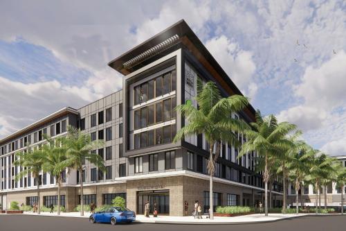 an architectural rendering of a building with palm trees at AC Hotel by Marriott Las Vegas Symphony Park in Las Vegas
