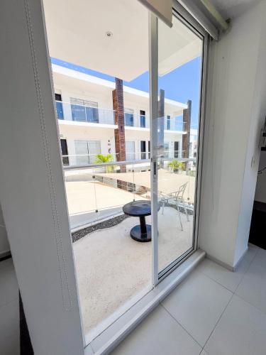 a window in a room with a view of a patio at Cache Hotel Boutique - Adults Only in Playa del Carmen