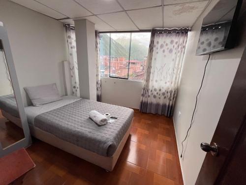 Katil atau katil-katil dalam bilik di Hostal El Mariscal