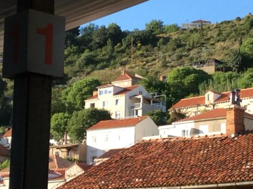 a view of a town from a roof at Main Bus Terminal Rooms in Dubrovnik