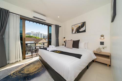 Postel nebo postele na pokoji v ubytování Wink Centre 9 Patong beach 4 beds