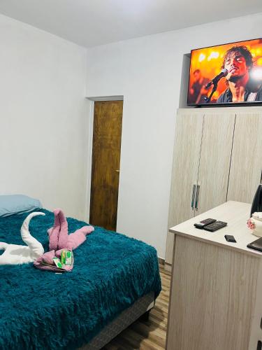 Postel nebo postele na pokoji v ubytování el balcón azul Fiambalá