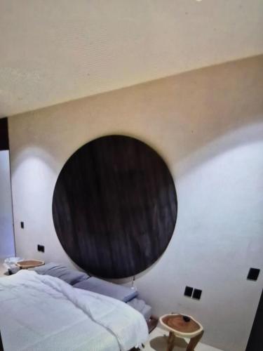 Chic apartment in Aldea Mayab with Lagoon access and private splash poolにあるベッド
