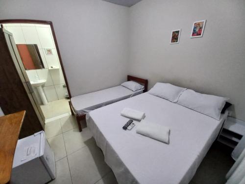 Katil atau katil-katil dalam bilik di Pousada Rio Bonito