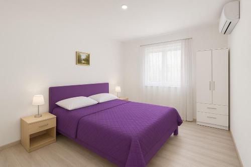 Ένα ή περισσότερα κρεβάτια σε δωμάτιο στο Sun All Day