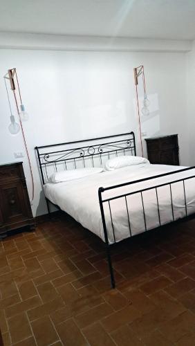 Katil atau katil-katil dalam bilik di Agriturismo Frigionaia