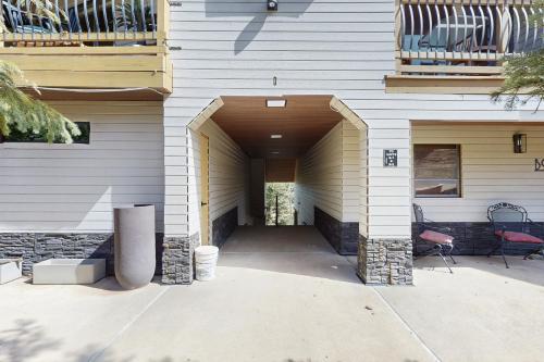 a hallway of a house with a patio at Ski Run B1 in Angel Fire