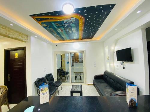 Μια τηλεόραση ή/και κέντρο ψυχαγωγίας στο Jewel Pyramids View Boutique Hotel