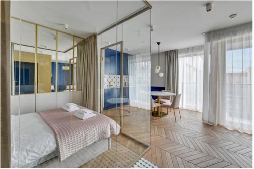 Posteľ alebo postele v izbe v ubytovaní Prestige Apart Gdańsk