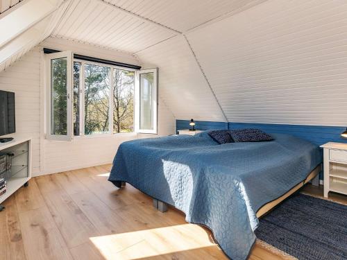 Ένα ή περισσότερα κρεβάτια σε δωμάτιο στο 6 person holiday home in Hals-By Traum