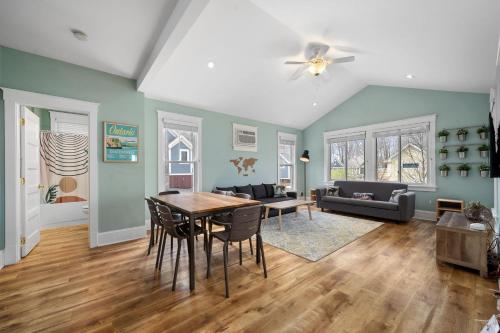 a living room with a table and chairs at The Hemlock - 1 Hollow in Cherry Valley