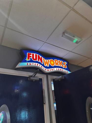 a sign on the ceiling of a food truck at The Aurora van at Presthaven sands holiday park and beach resort in North Wales- 8 berth in Prestatyn