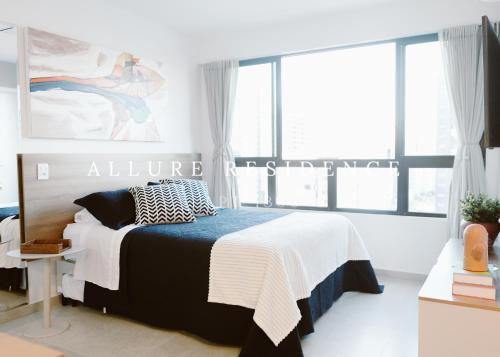 Katil atau katil-katil dalam bilik di Flat Luxo Boa Viagem Allure 1305