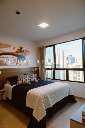 Katil atau katil-katil dalam bilik di Flat Luxo Boa Viagem Allure 1305