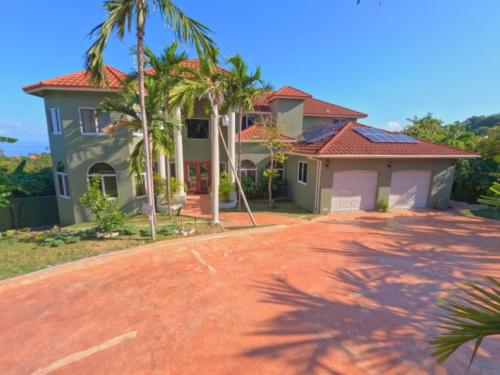 Foto Montego Bay's asuva majutusasutuse Escape-Relax-Repeat Morris Home Resorts galeriist