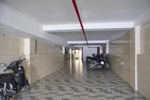 a group of motorcycles parked in a hallway at Ngo - The Gallery Hotel Dalat in Da Thanh