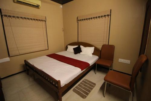 Postel nebo postele na pokoji v ubytování A2A Hotel