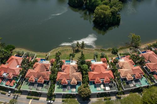 an aerial view of a resort complex with a body of water at Golden Cotton Villa 3BR Lagoon View by GRF in Laguna Phuket