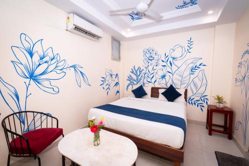 Ένα ή περισσότερα κρεβάτια σε δωμάτιο στο Raj Residency