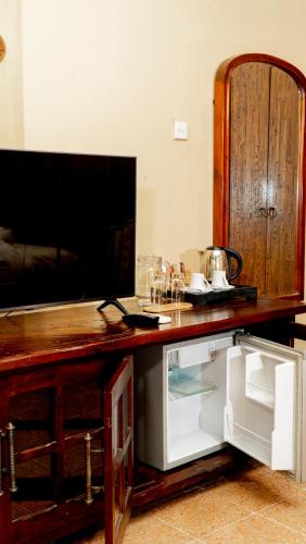 TV a/nebo společenská místnost v ubytování Kayu Arum Resort
