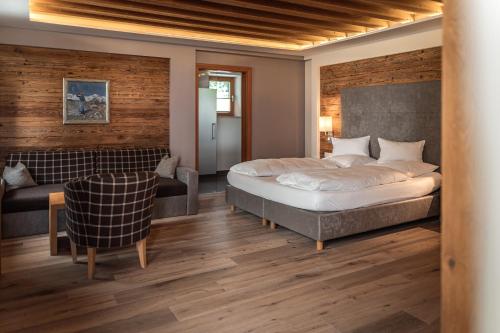 Maraias - Luxury Suites & Apartmentsにあるベッド