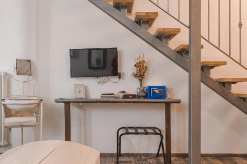 TV a/nebo společenská místnost v ubytování Trieste Art Loft