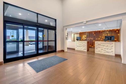a large room with a large window and a room with wooden floors at Comfort Inn Somerset - Lake Cumberland in Somerset