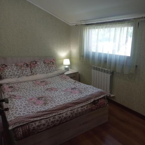 Ένα ή περισσότερα κρεβάτια σε δωμάτιο στο Violet guest house