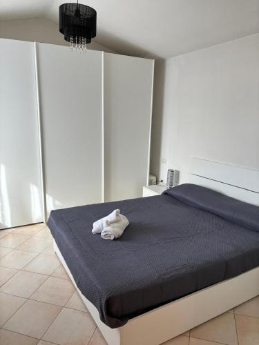 Ένα ή περισσότερα κρεβάτια σε δωμάτιο στο Cinzia House